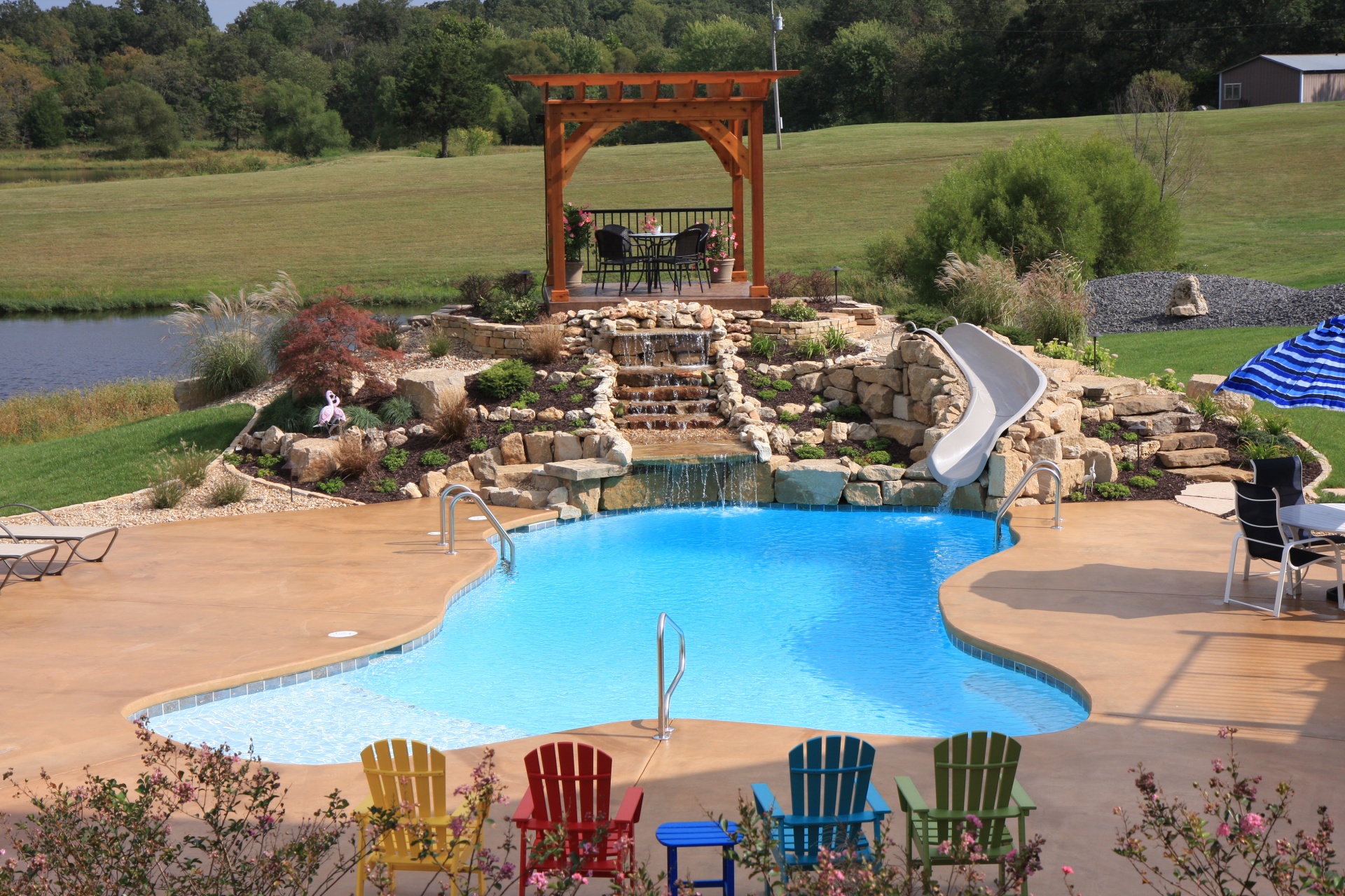 Gott Freeform Pool Gazebo & Waterfall Daytime