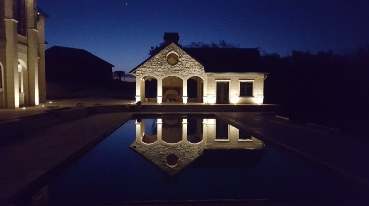 Kampteter Night Pool House w_ Reflection (1)